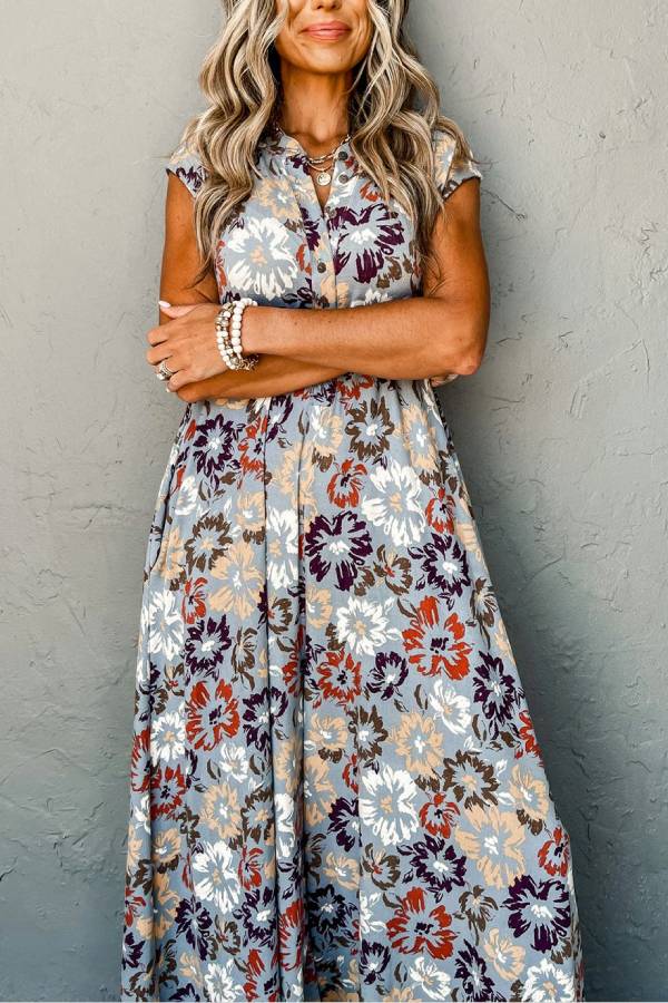 Chloe® | Sky blue sleeveless floral jumpsuit with pockets and wide legs
