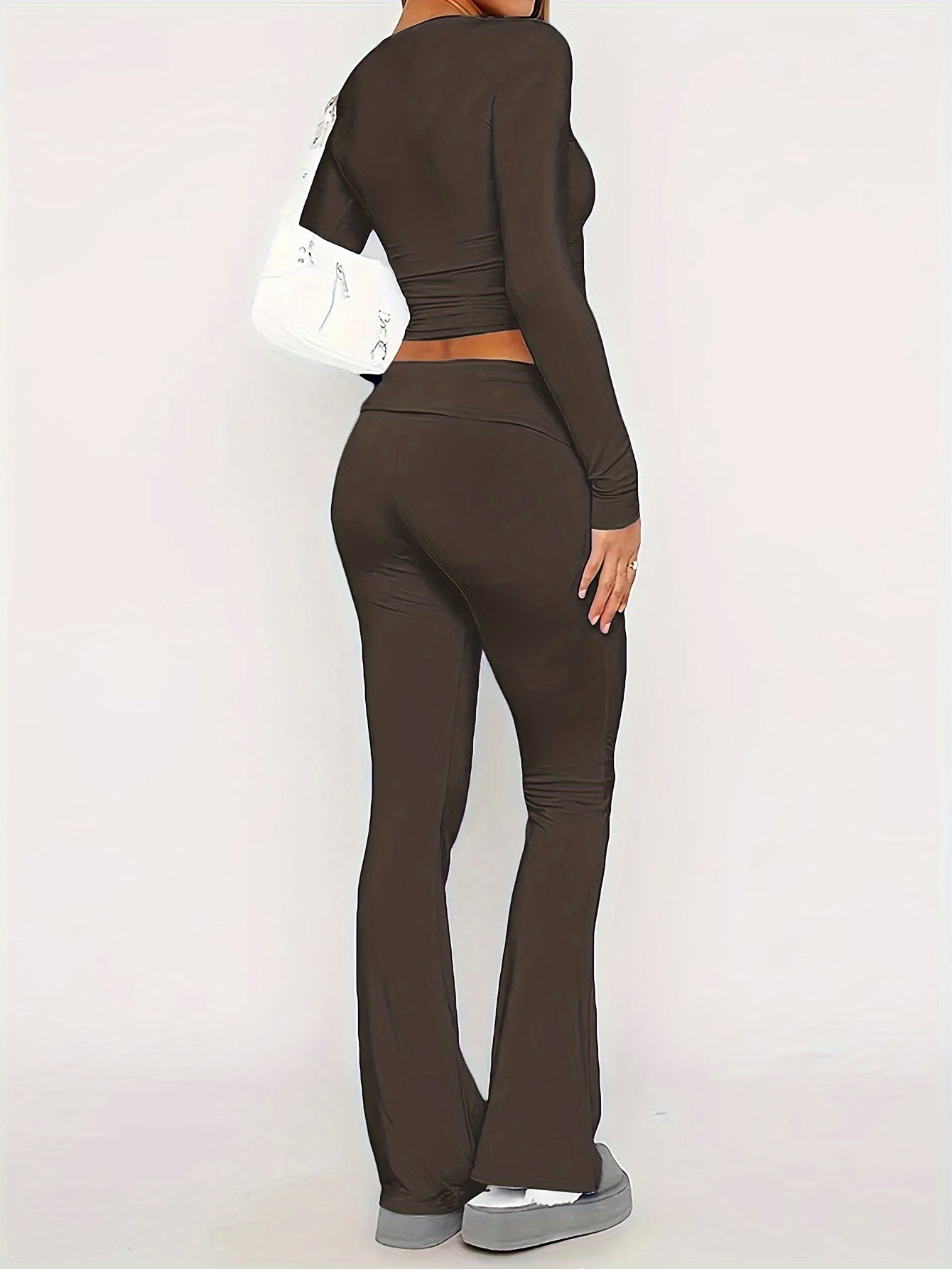 Elena® | Slim fit lounge set with a crop top and flared trousers