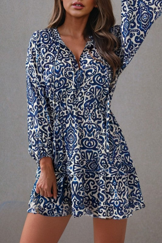 Alana® | Geometric ruffled mini dress with drawstring and V-neck