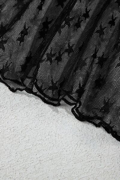Aurora® | Transparent blouse with a star crew neck and long sleeves