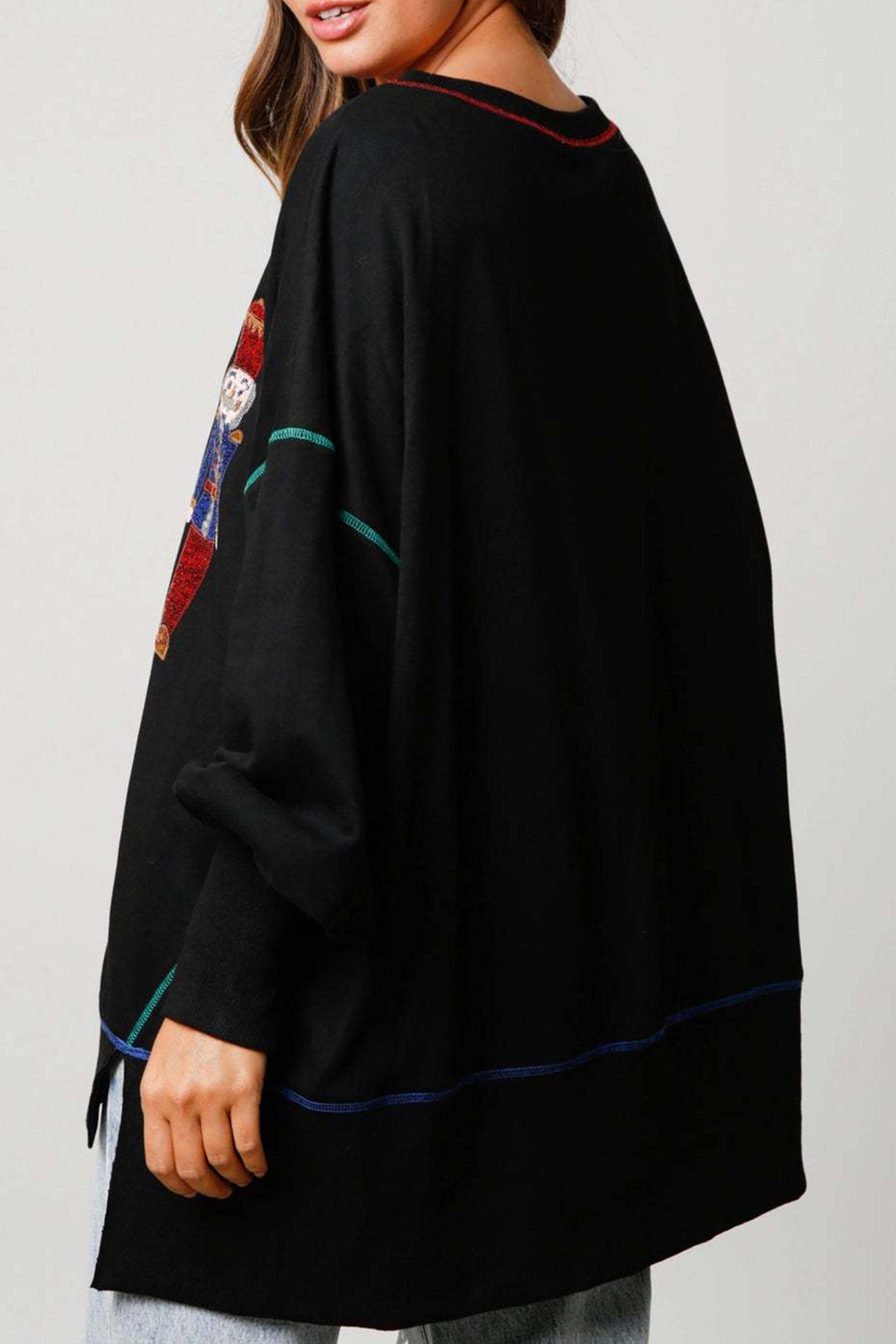 Dominique® | Sequin graphic sweatshirt with slit hem