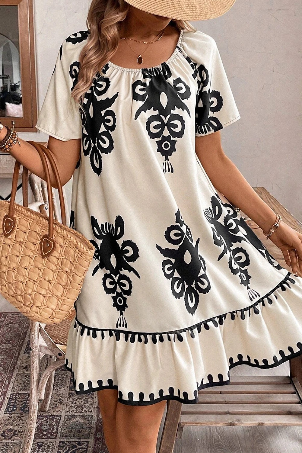 Dayana® | Apricot-colored, loose mini dress with ethnic print and ruffled hem