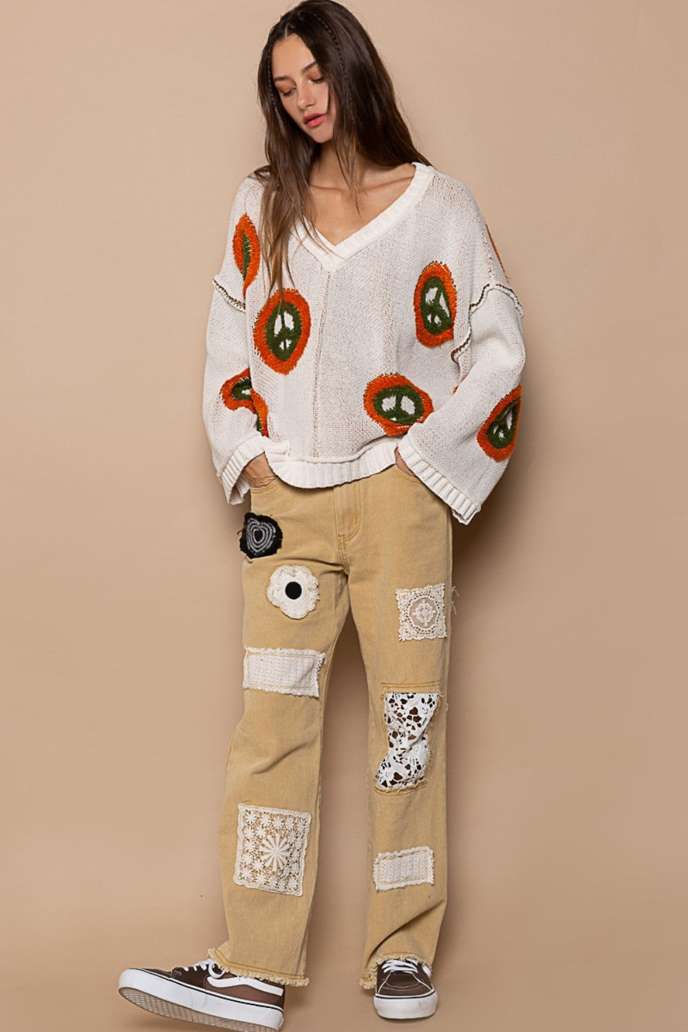 Anya® | Long sleeve peace print V-neck sweater