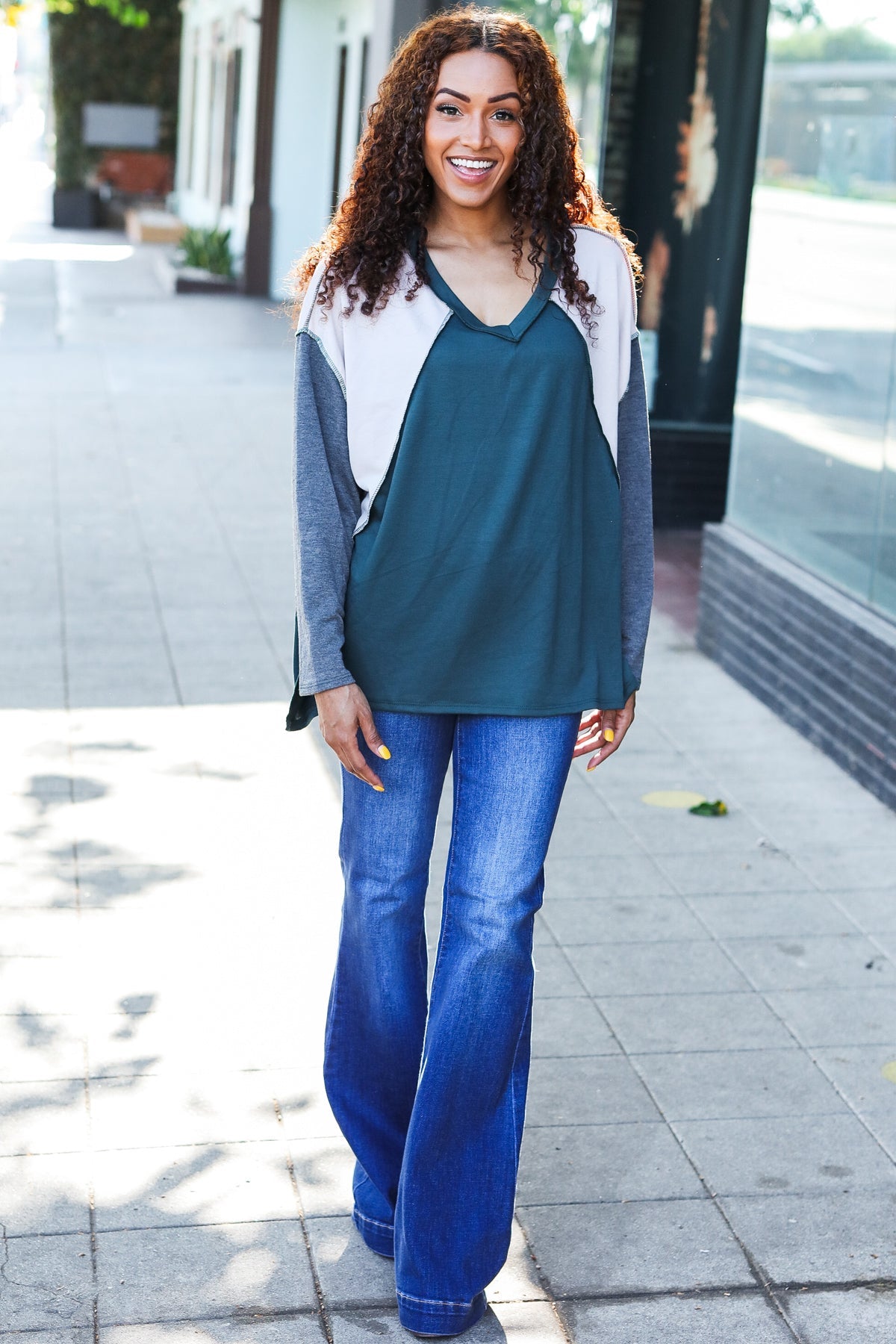 Beate® | Standout hunter green raglan top with color block outseam and V-neckline