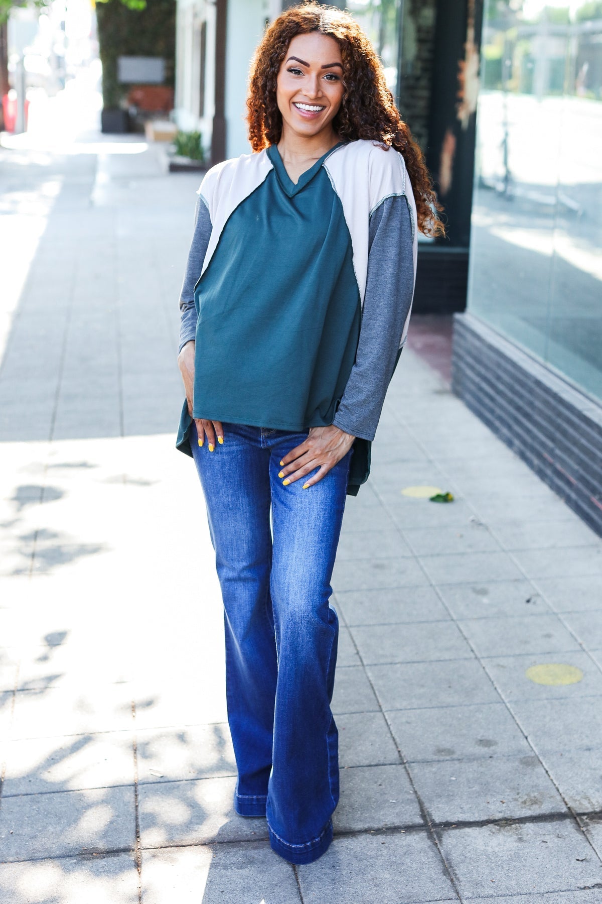 Beate® | Standout hunter green raglan top with color block outseam and V-neckline