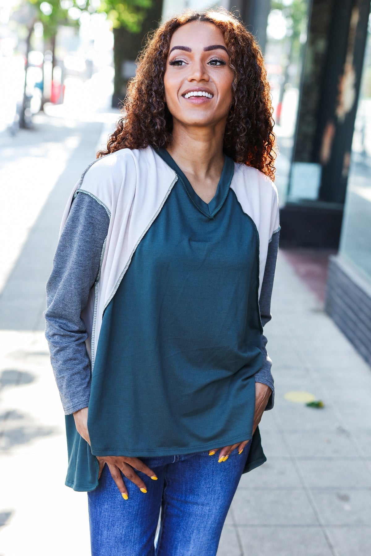 Beate® | Standout hunter green raglan top with color block outseam and V-neckline