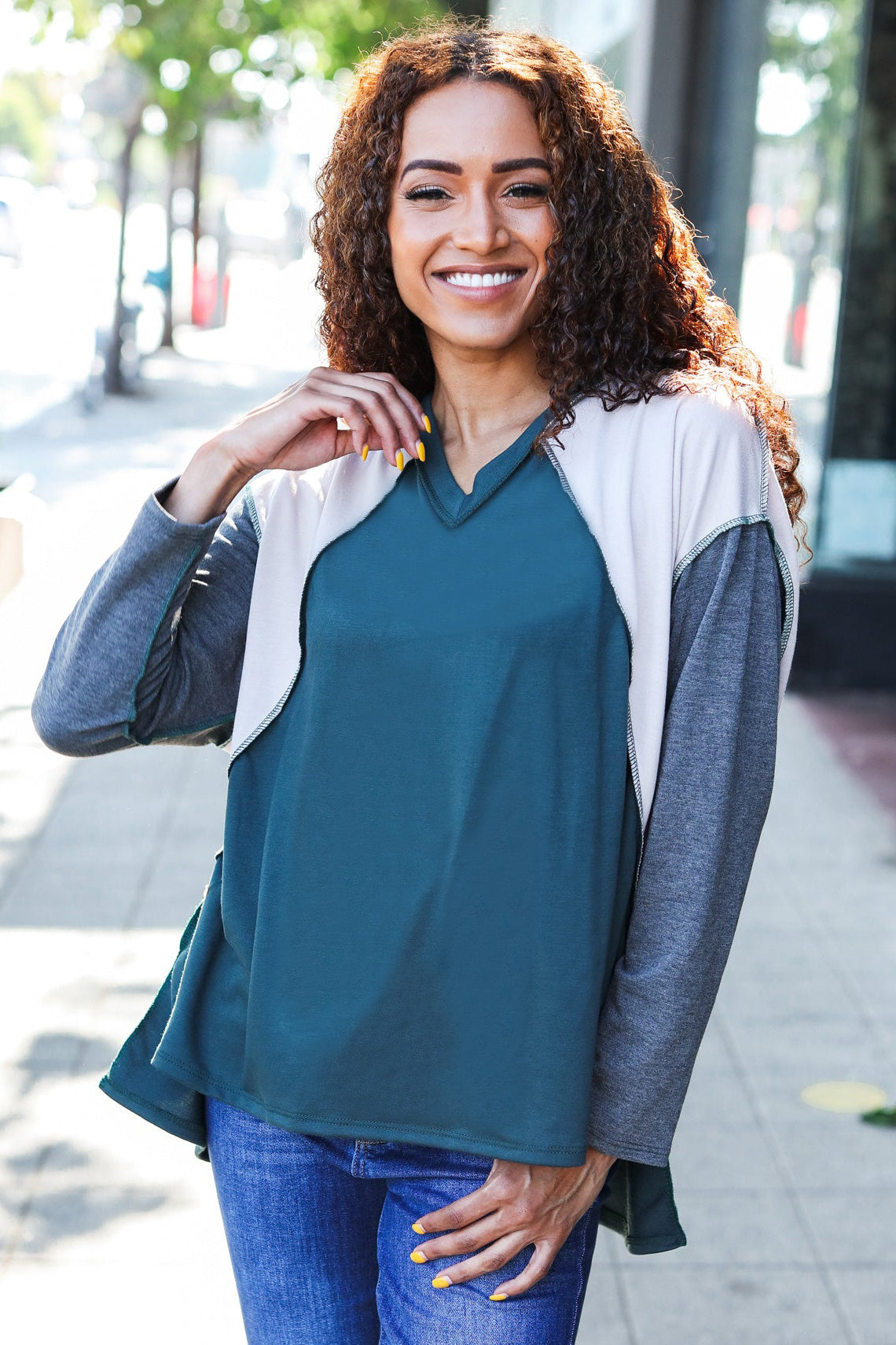 Beate® | Standout hunter green raglan top with color block outseam and V-neckline