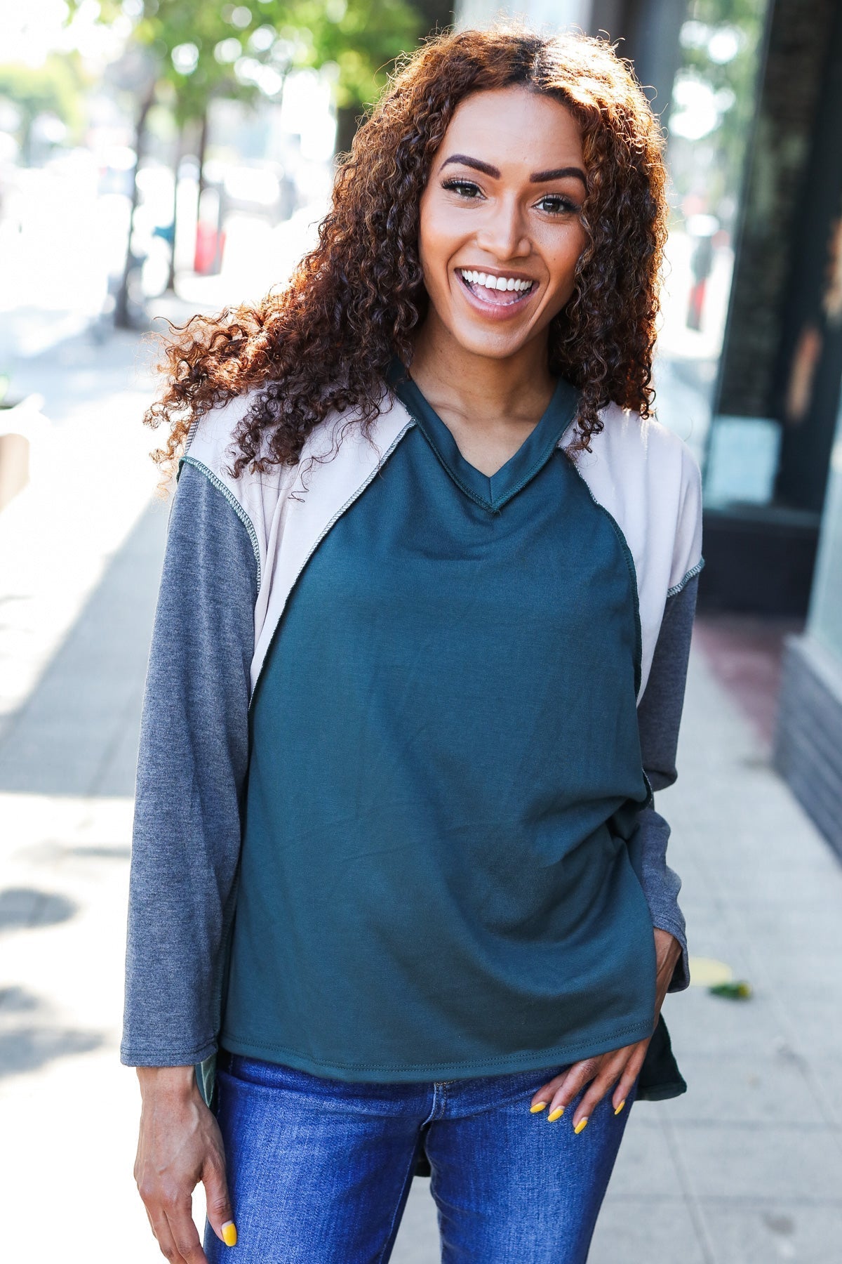 Beate® | Standout hunter green raglan top with color block outseam and V-neckline