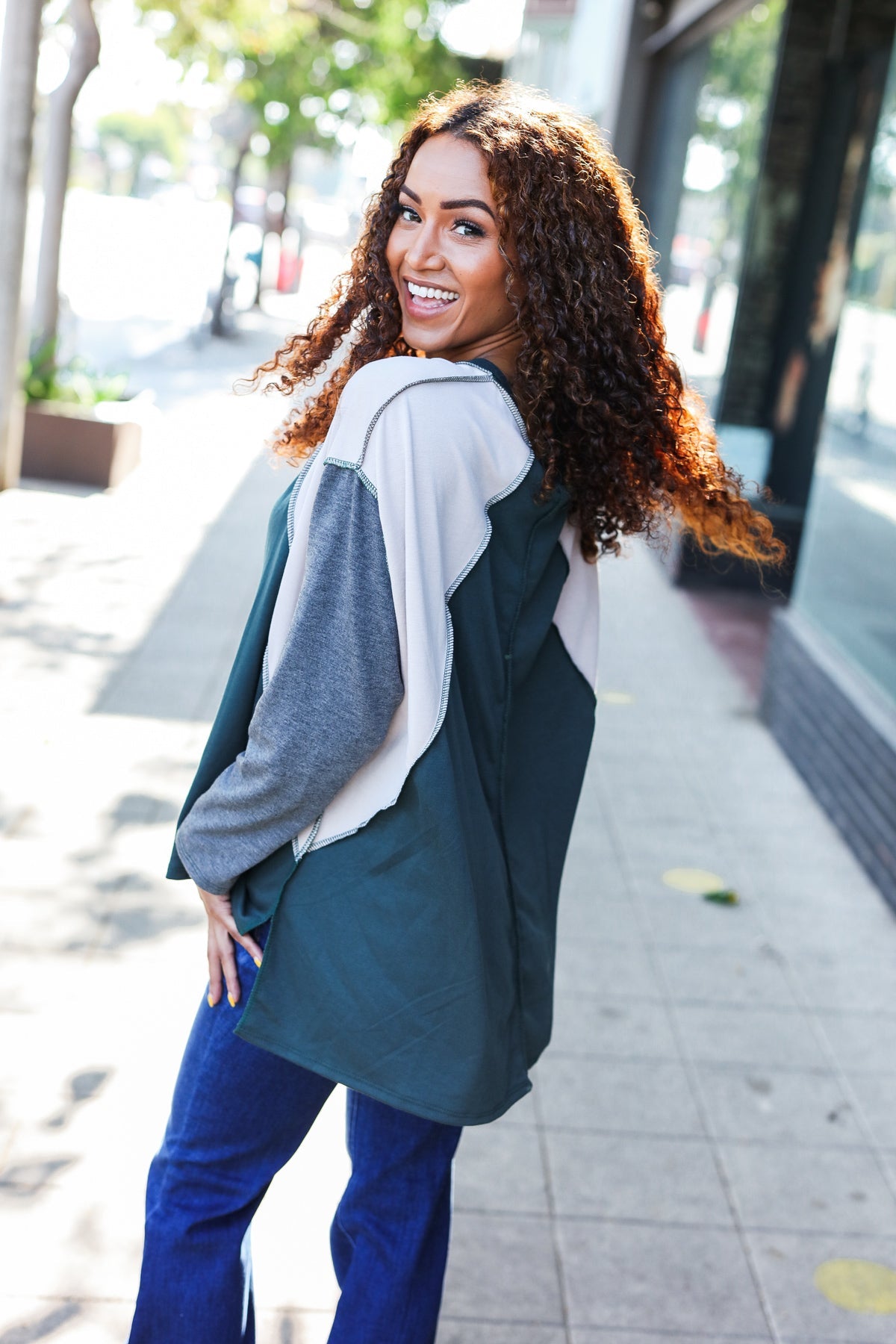 Beate® | Standout hunter green raglan top with color block outseam and V-neckline