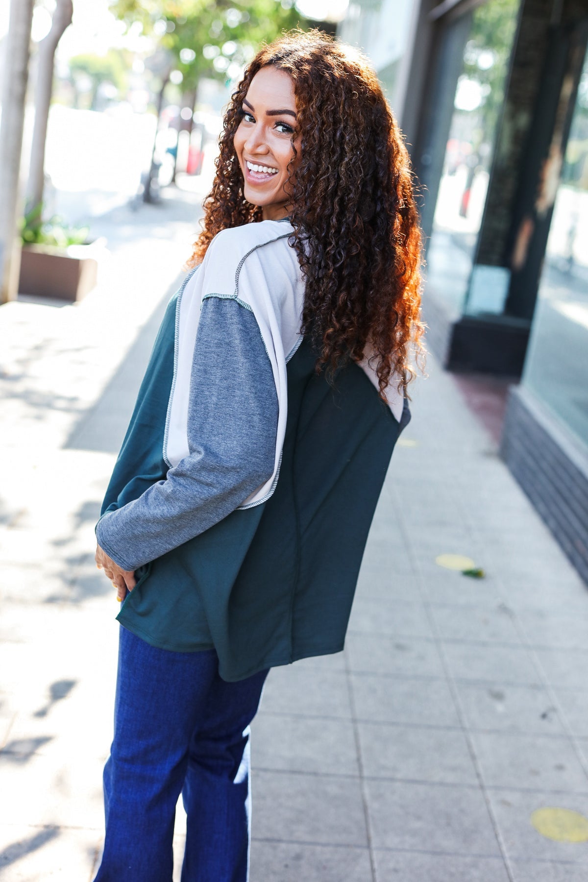Beate® | Standout hunter green raglan top with color block outseam and V-neckline