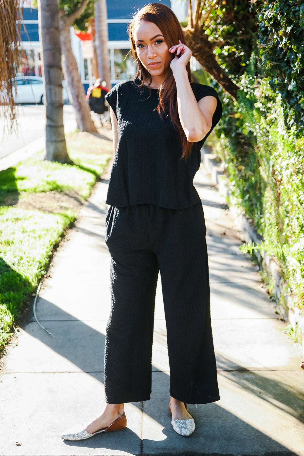 Anya® | Standout black structured pants suit with shirt and crisscross back