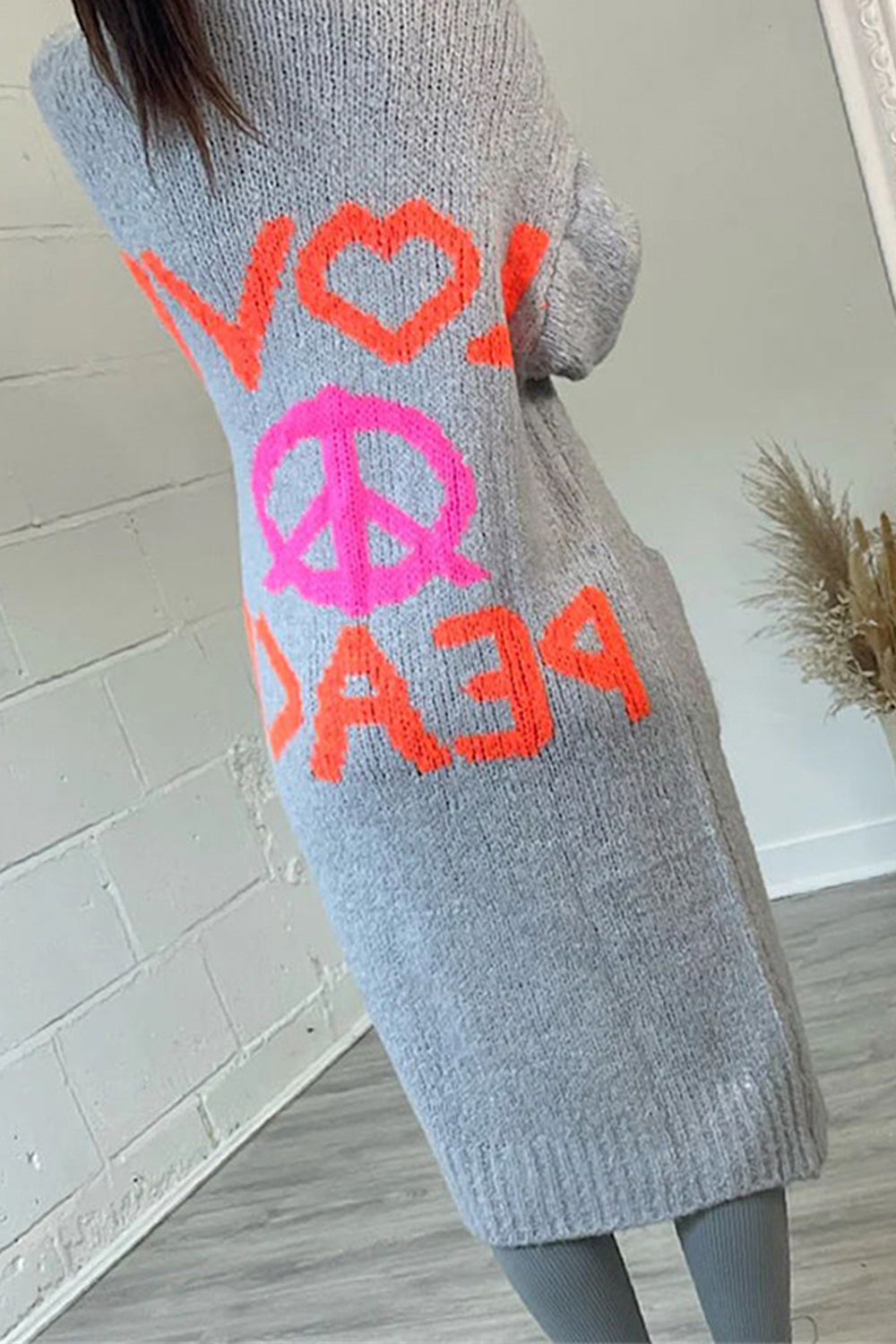Clara® | Long-sleeved peace sign cardigan
