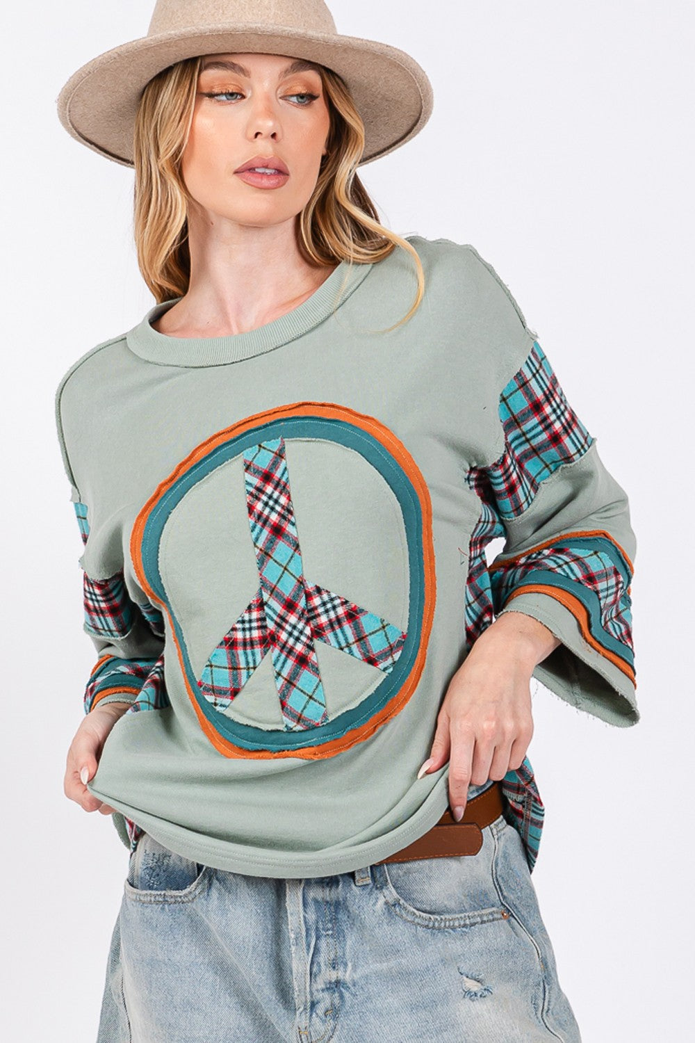 Ariana® | SAGE + FIG top with peace appliqué patch and contrast check