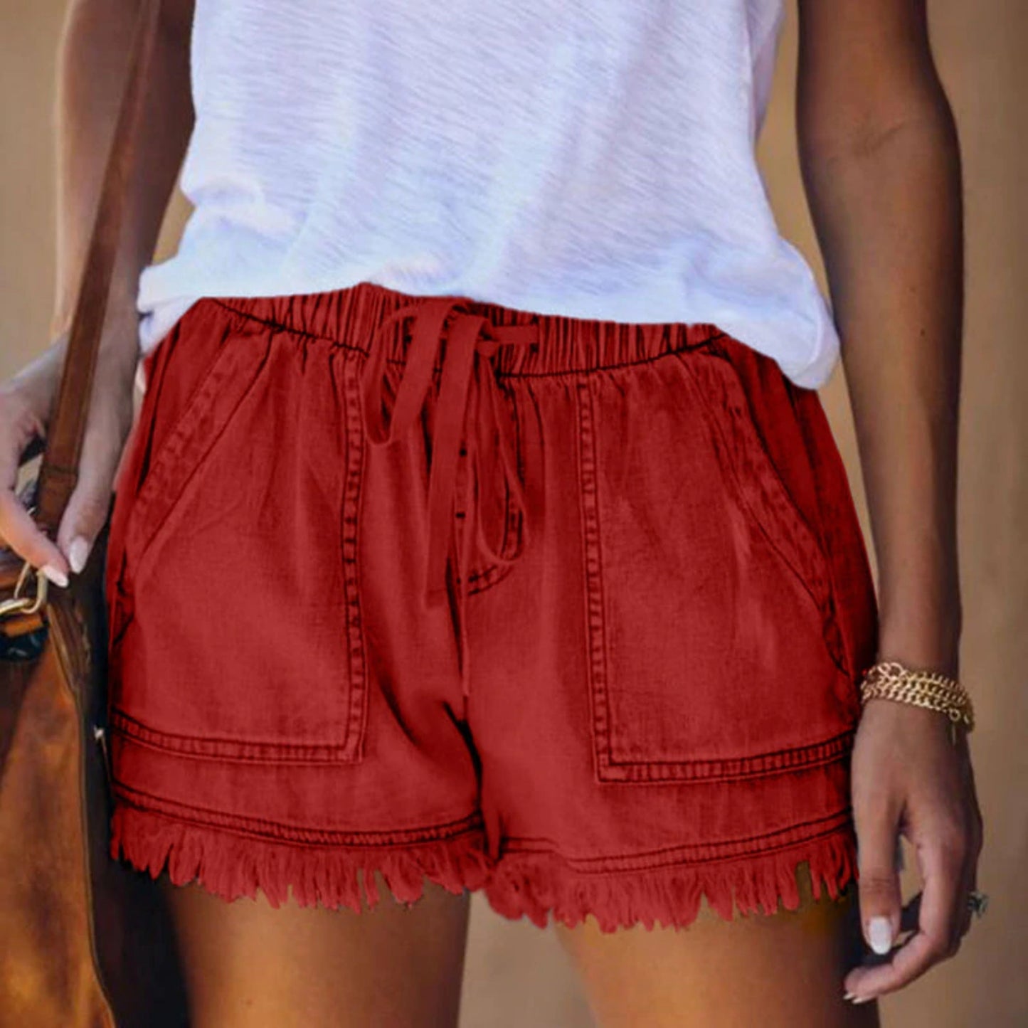 Claudia® | Women's shorts with drawstring and fringed hem