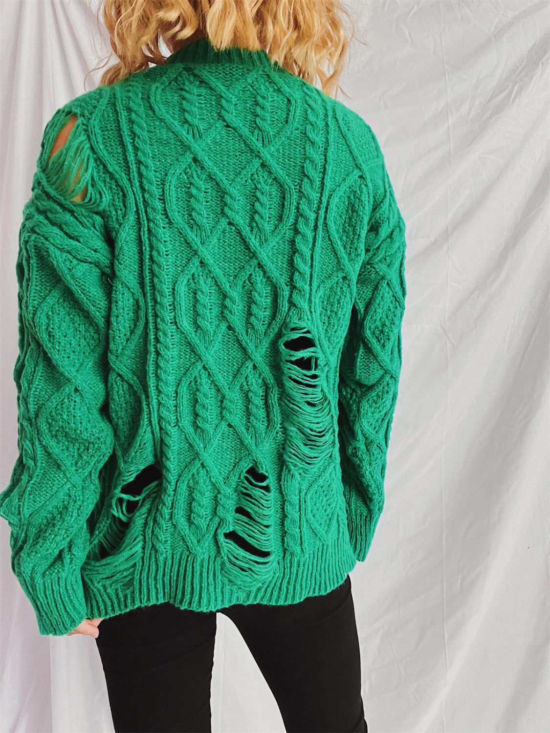 Clara® | Long-sleeved, crew-neck, distressed cable-knit sweater