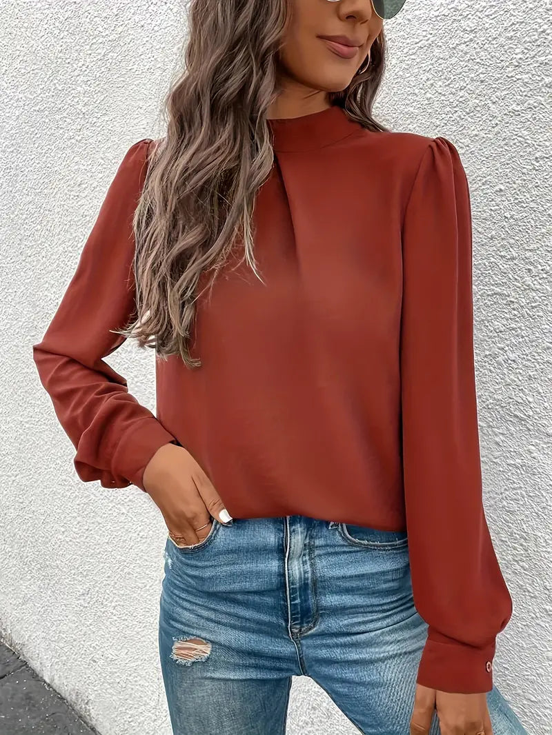Brownlee® | Simple, Elegant Blouse With A Turtleneck And Puff Sleeves