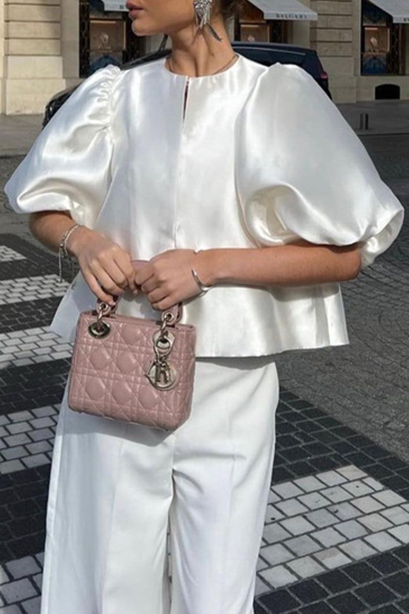Claudia® | Elegant solid color O-neck tops from celebrities