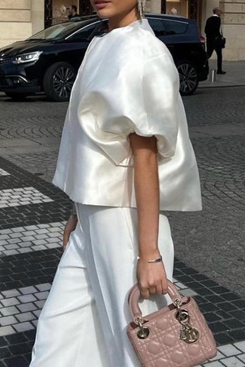 Claudia® | Elegant solid color O-neck tops from celebrities