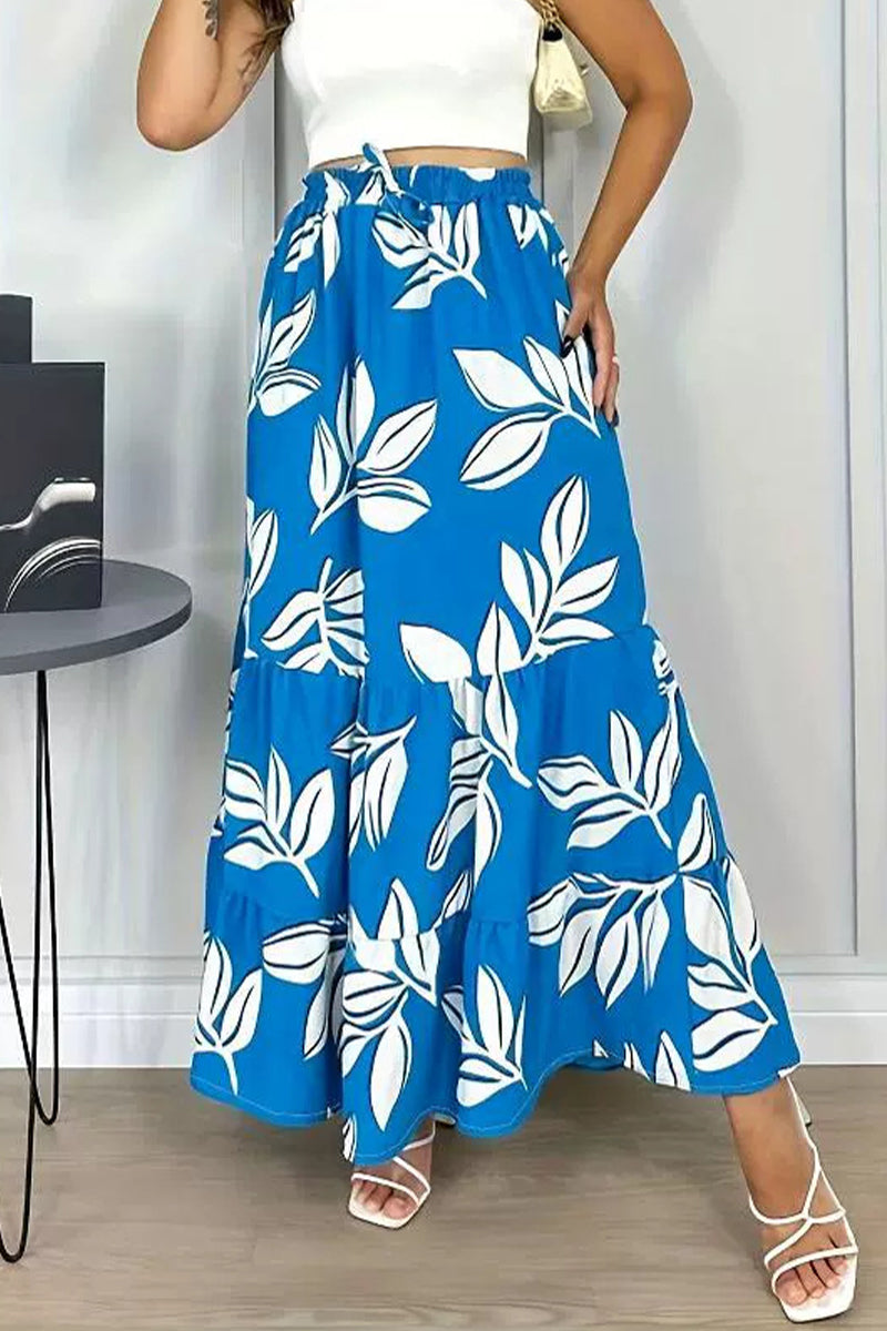 Claudia® | Elegant, loose, floral frenulum type A trousers with an all-over print