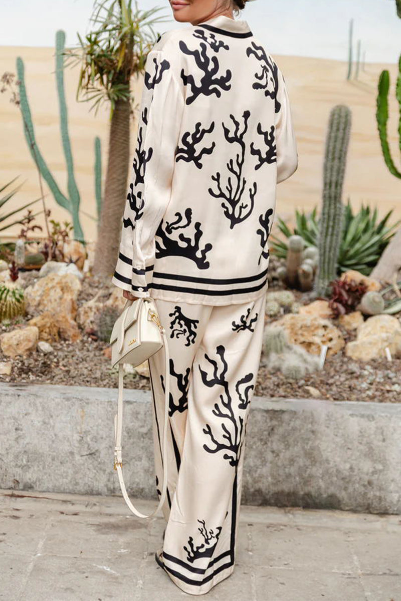Anne® | Casual holiday two-piece suit with a geometric print, turn-down collar and long sleeves