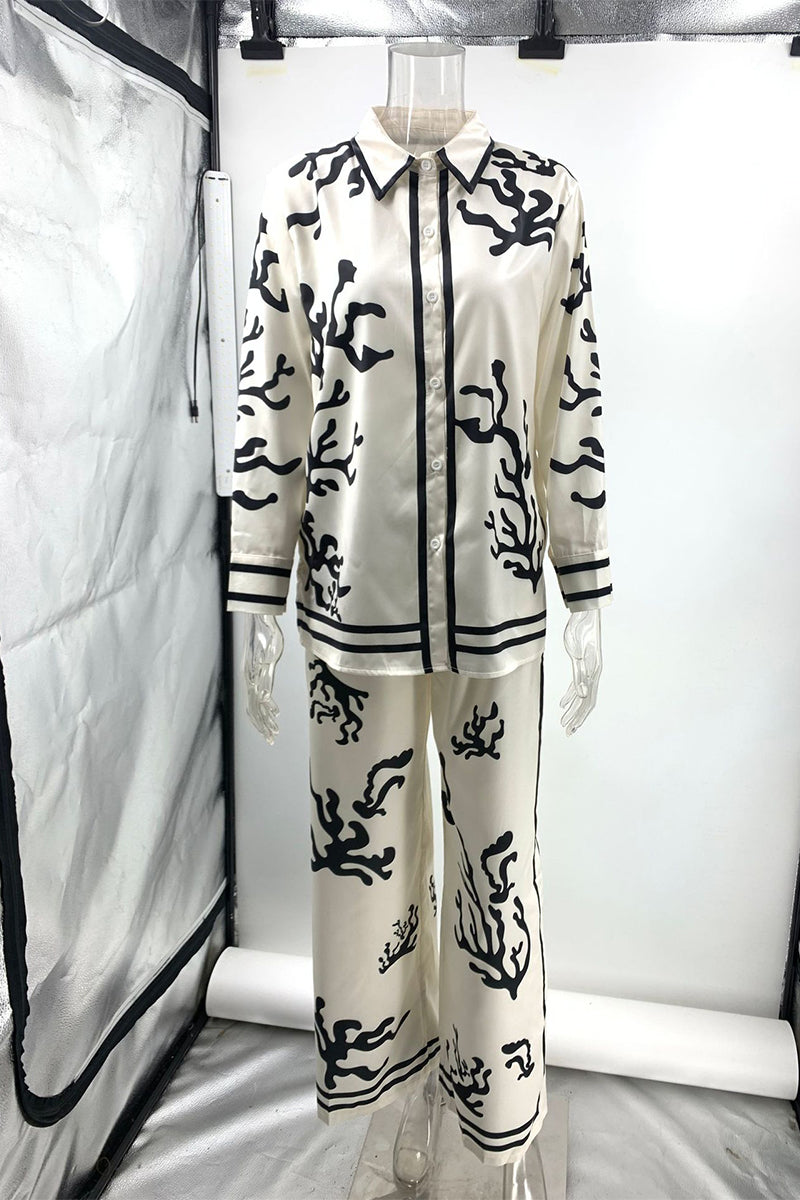 Anne® | Casual holiday two-piece suit with a geometric print, turn-down collar and long sleeves