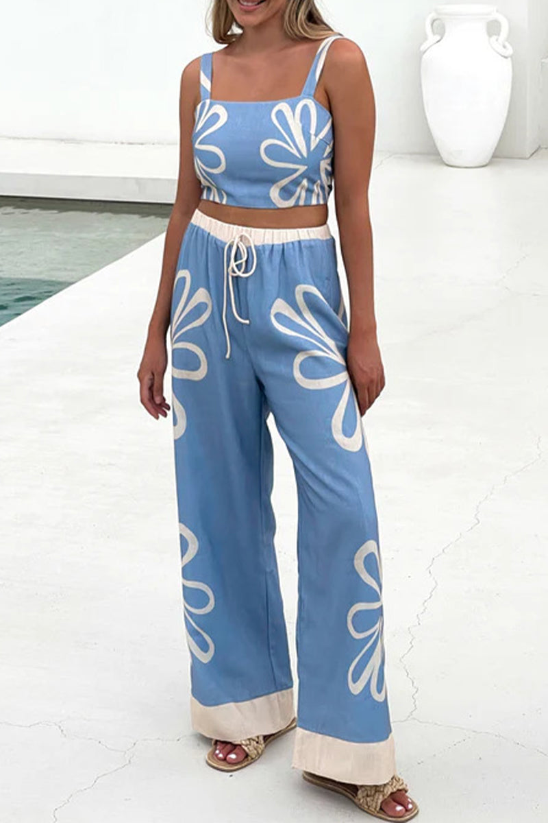 Adriana® | Casual sleeveless two-piece with holiday florals, lace-up detailing and contrast square neckline