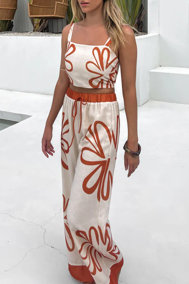 Adriana® | Casual sleeveless two-piece with holiday florals, lace-up detailing and contrast square neckline
