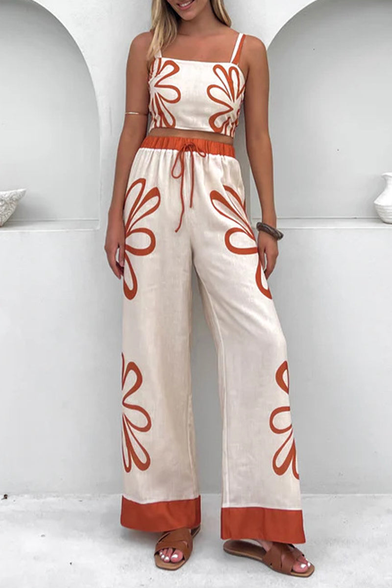 Adriana® | Casual sleeveless two-piece with holiday florals, lace-up detailing and contrast square neckline