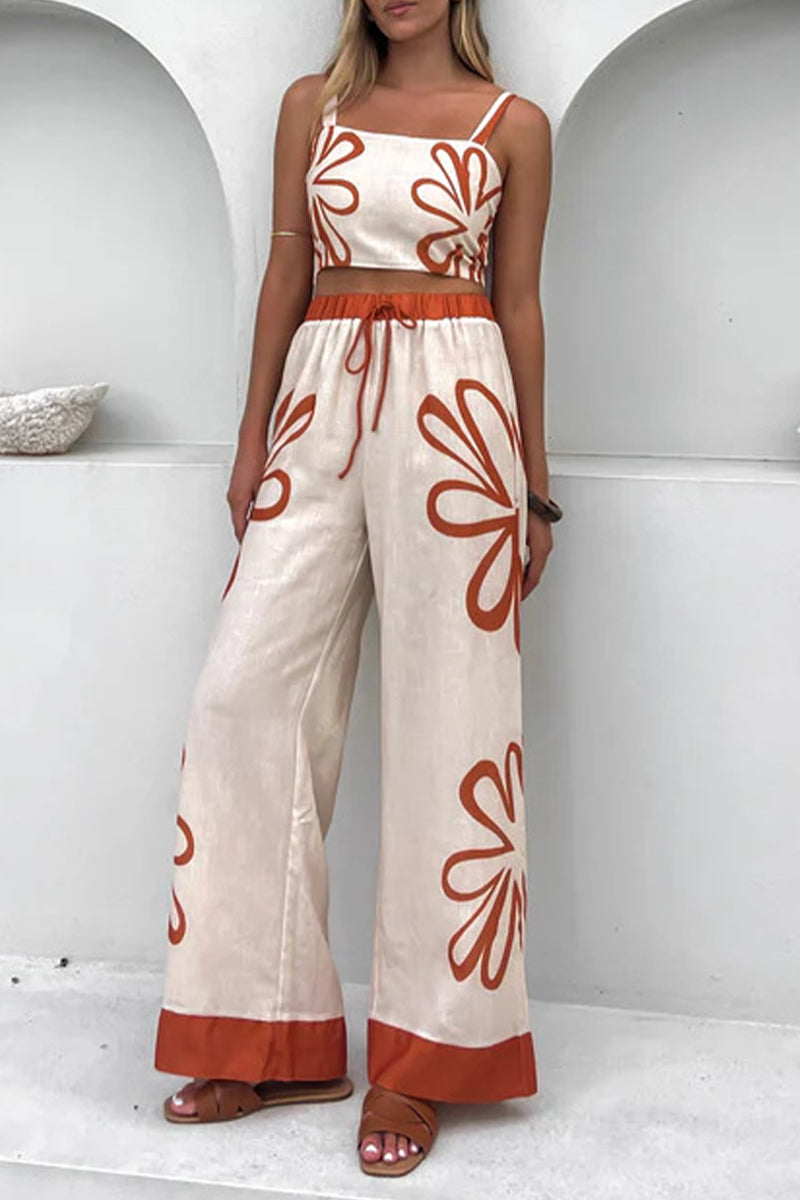 Adriana® | Casual sleeveless two-piece with holiday florals, lace-up detailing and contrast square neckline