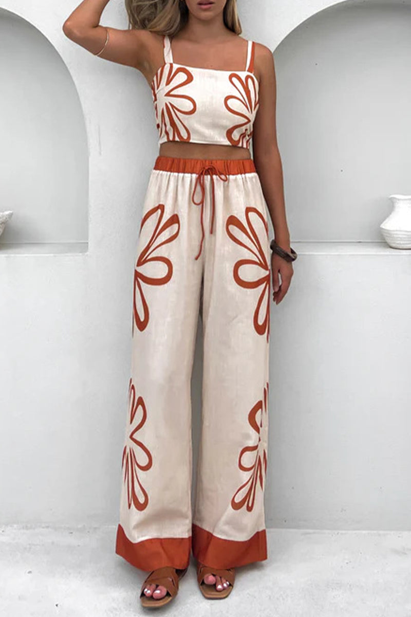 Adriana® | Casual sleeveless two-piece with holiday florals, lace-up detailing and contrast square neckline