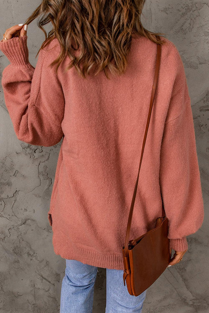 Alba® | Knitted sweater with lantern sleeves and pockets
