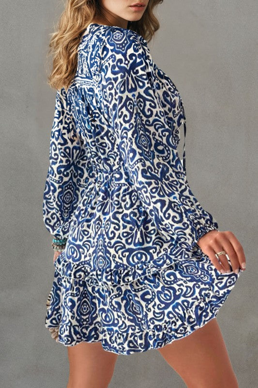 Alana® | Geometric ruffled mini dress with drawstring and V-neck