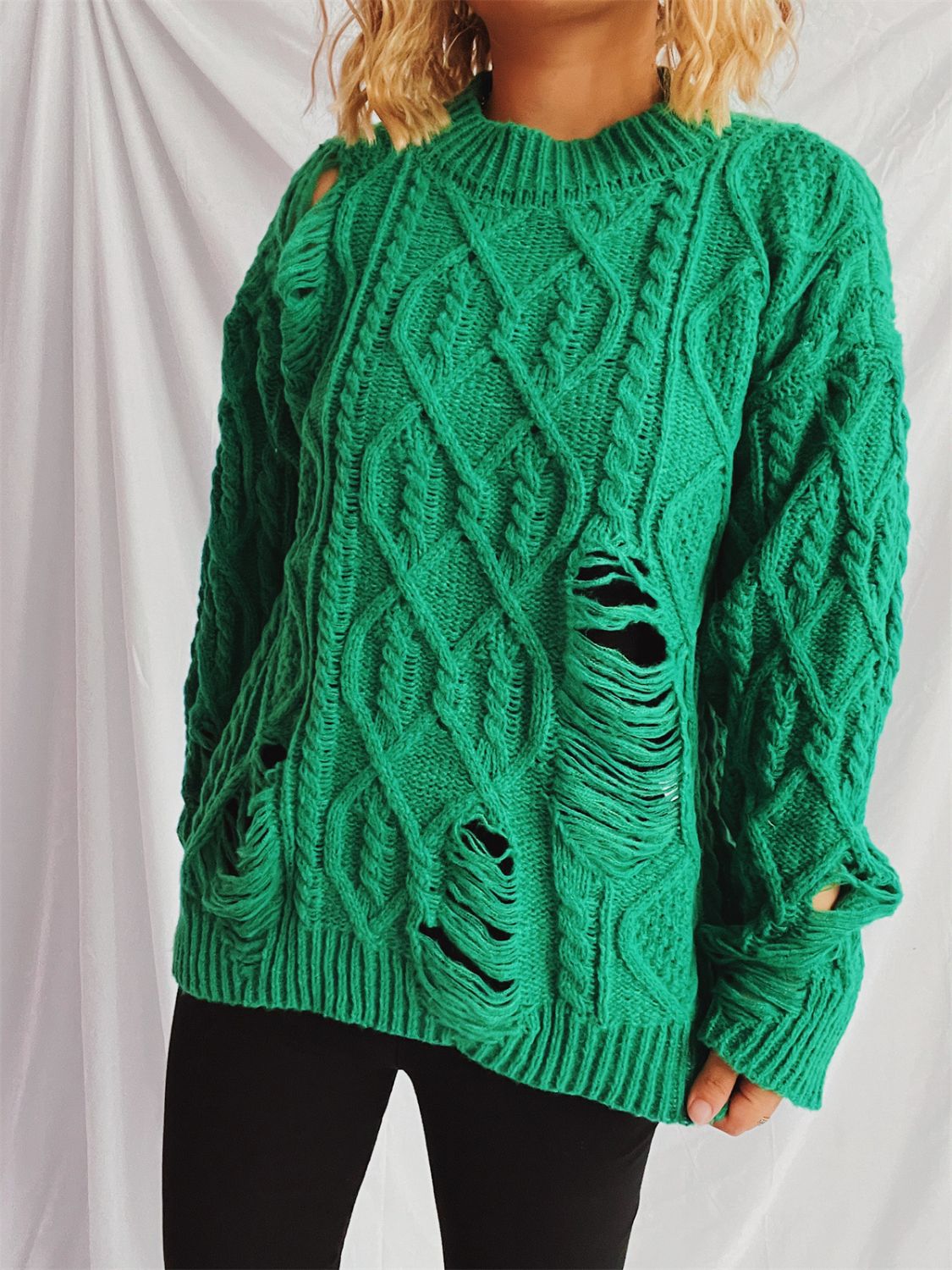 Clara® | Long-sleeved, crew-neck, distressed cable-knit sweater