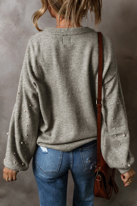 Carolina® | Beaded sweater with dropped shoulder and crew neck