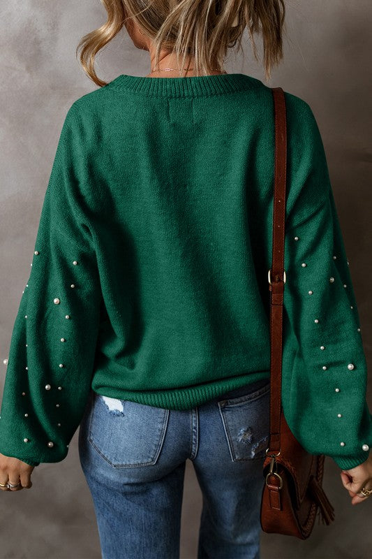 Carolina® | Beaded sweater with dropped shoulder and crew neck