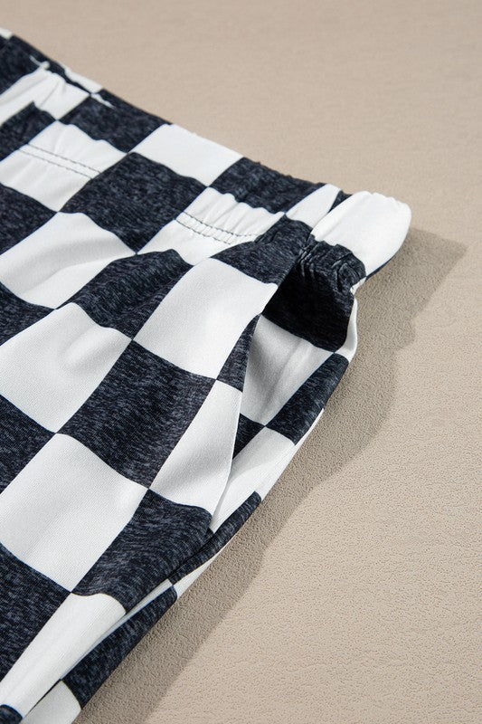 Aubrey® | Checked flared trousers with a high waist