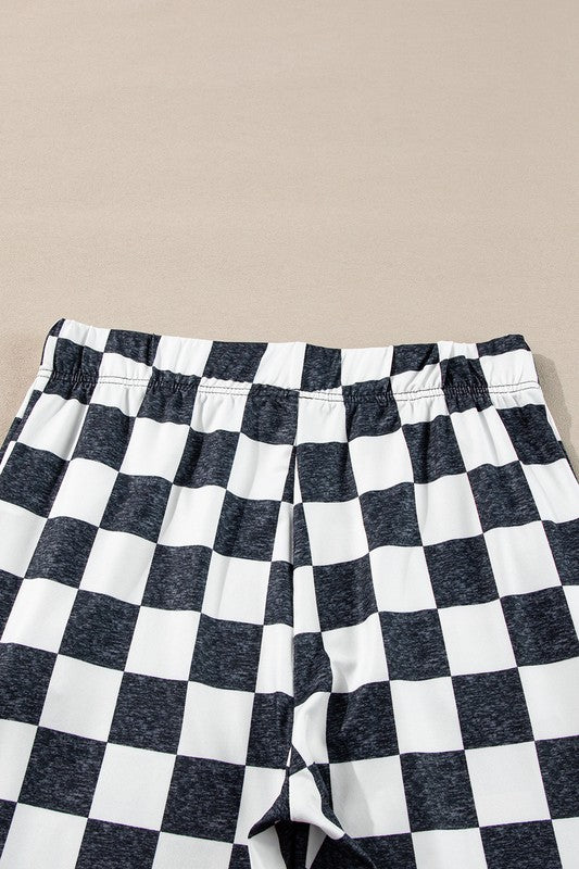 Aubrey® | Checked flared trousers with a high waist