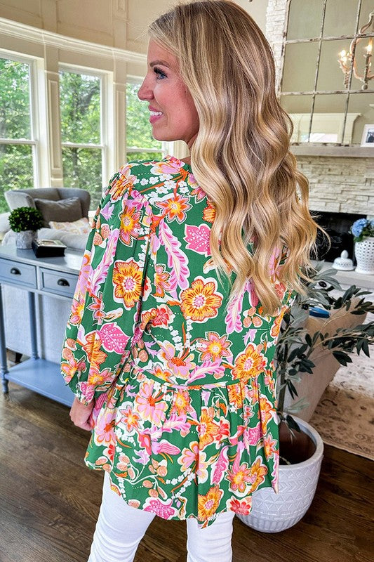 Dorotea® | Green floral peplum blouse with puff sleeves and V-neck