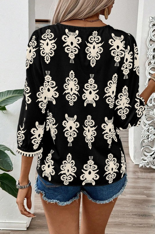 Cassia® | Geometric printed women's blouse with 3/4 sleeves and V-neck