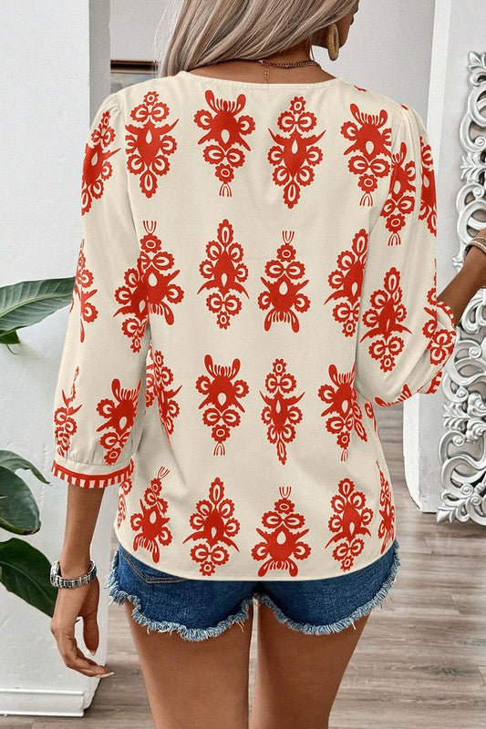 Cassia® | Geometric printed women's blouse with 3/4 sleeves and V-neck