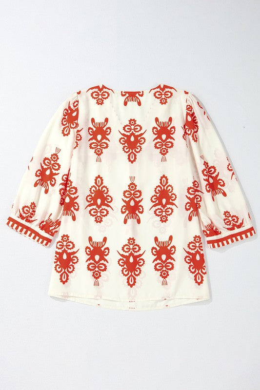 Cassia® | Geometric printed women's blouse with 3/4 sleeves and V-neck