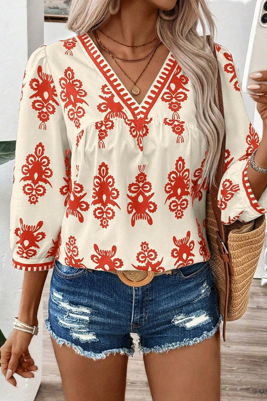 Cassia® | Geometric printed women's blouse with 3/4 sleeves and V-neck