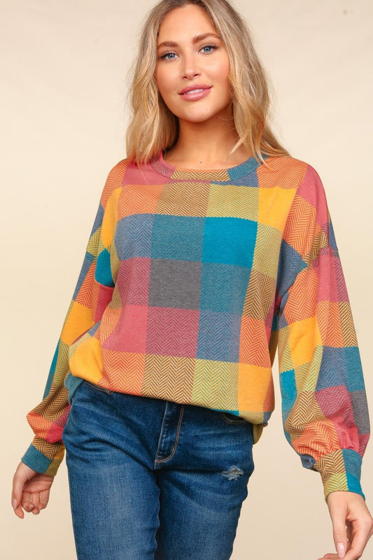 Clara® | Haptics color block check crew neck top