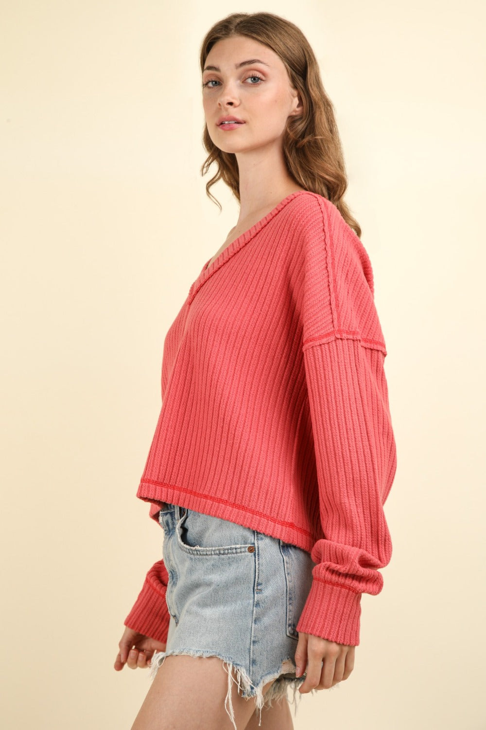 Blanca® | Ribbed knit top with exposed seam and V-neck