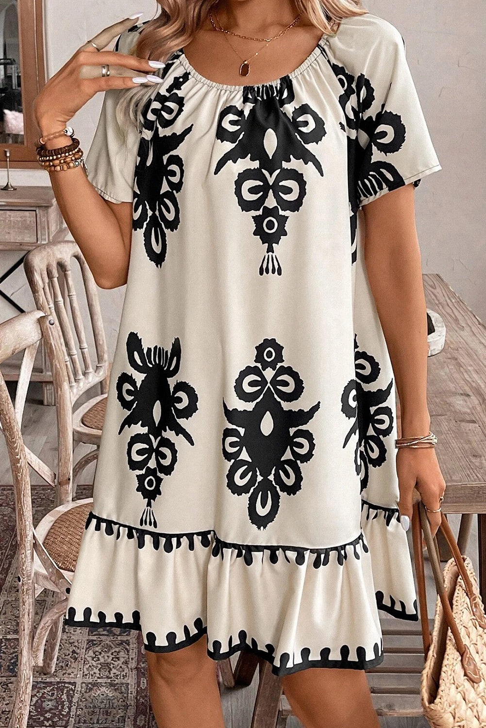 Dayana® | Apricot-colored, loose mini dress with ethnic print and ruffled hem