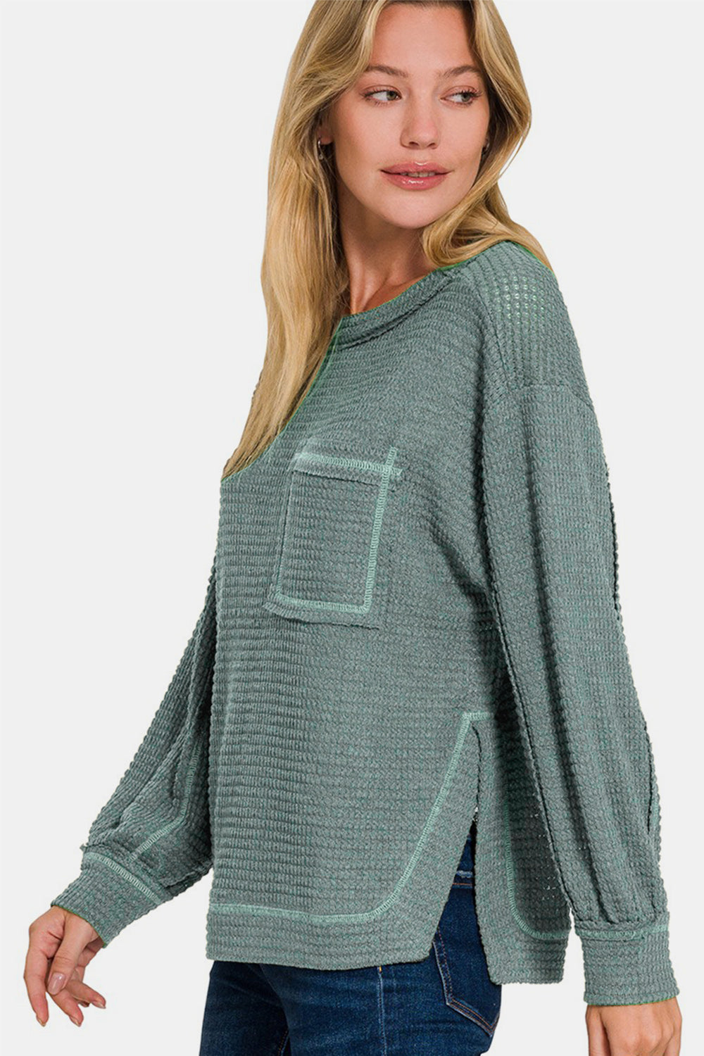 Daria® | Long sleeve top with exposed seam and side slit