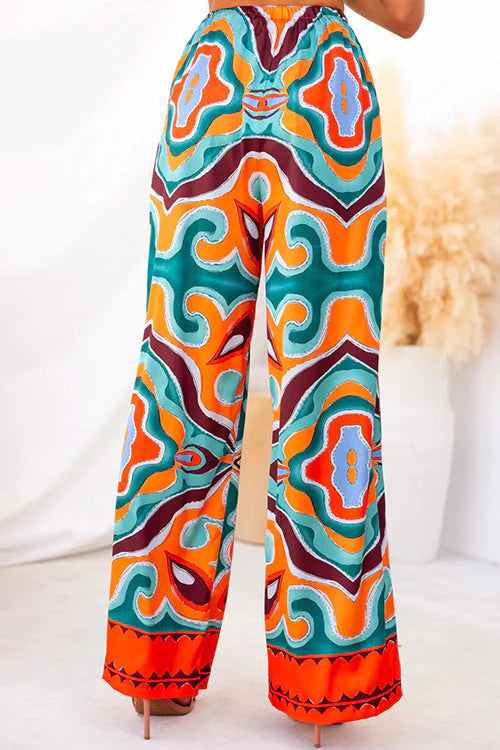 Consuelo® | Satin ethnic abstract print wide leg pants in satin with elastic waistband and pockets
