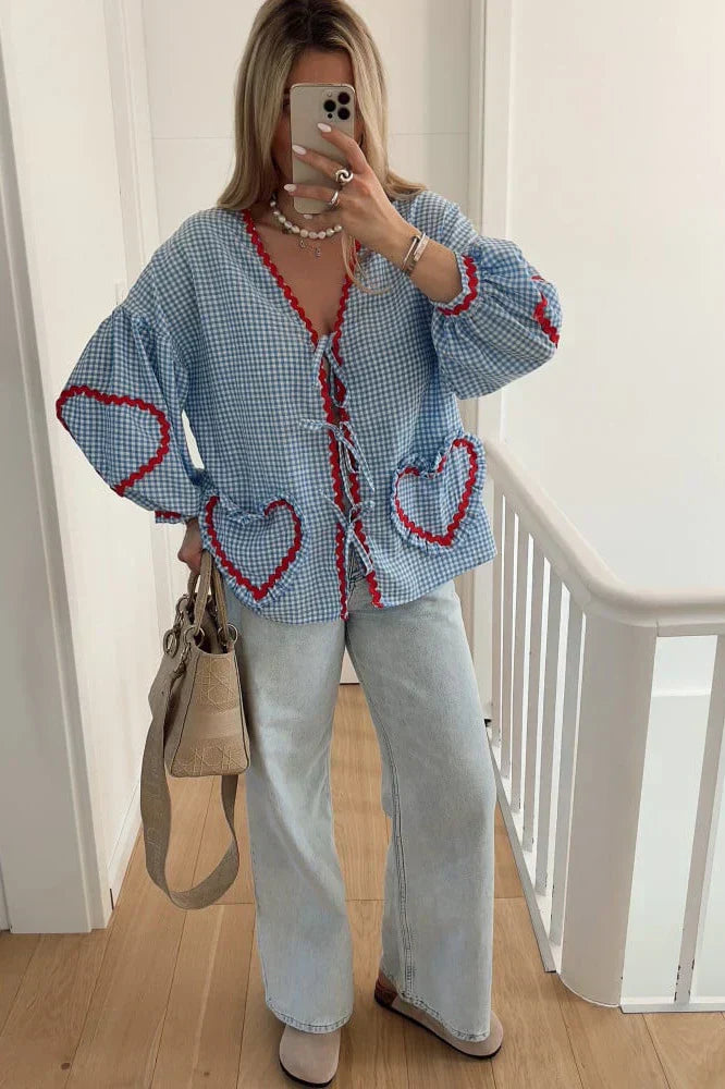Carolina® | Checked blouse with bow and heart-shaped details