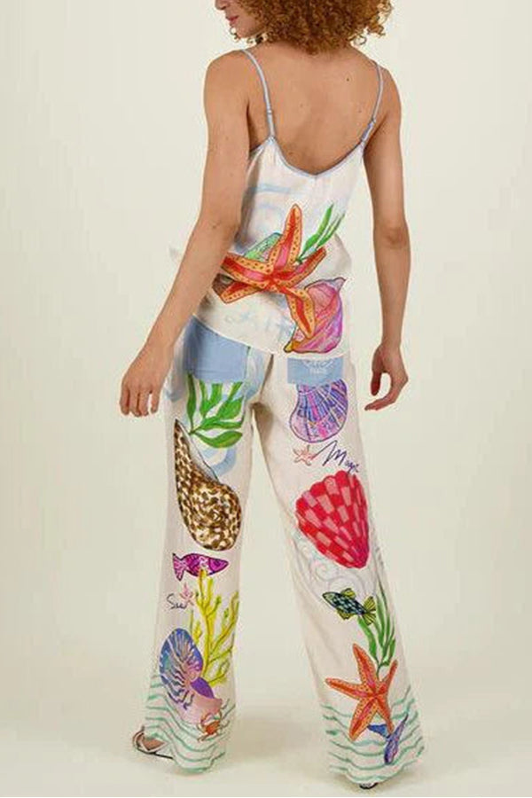 Ana® | Satin pants with a unique print on the back, elastic waist, pockets and wide leg