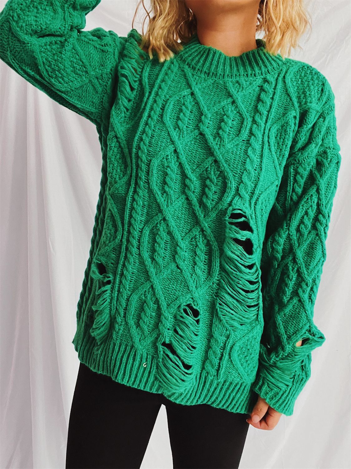 Clara® | Long-sleeved, crew-neck, distressed cable-knit sweater